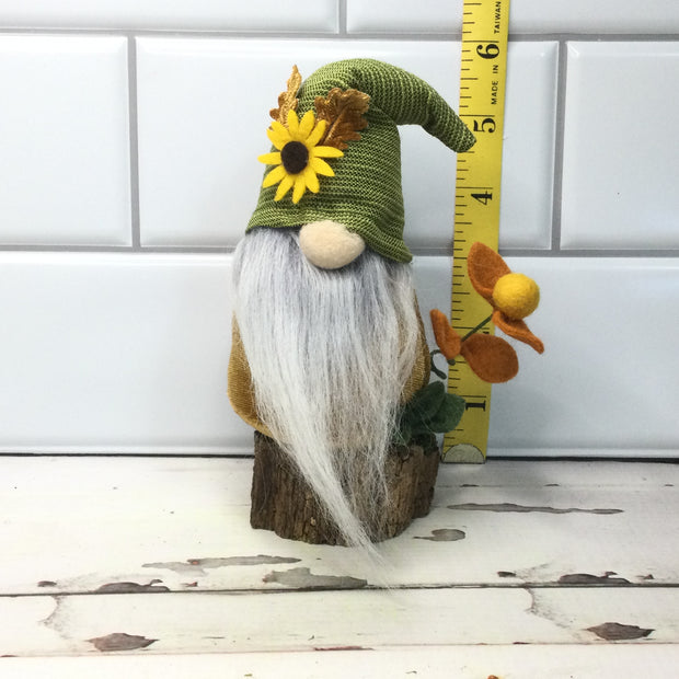 Sunflower Gnome with Flora on Natural Tree Stump